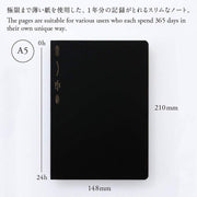 Nitto Stalogy A5 365Days Grid Notebook with minimalist black cover and gold lettering showing lay-flat binding