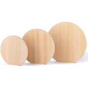 Umezawa premium round cutting board made of light-colored Aomori Hiba wood showing natural grain