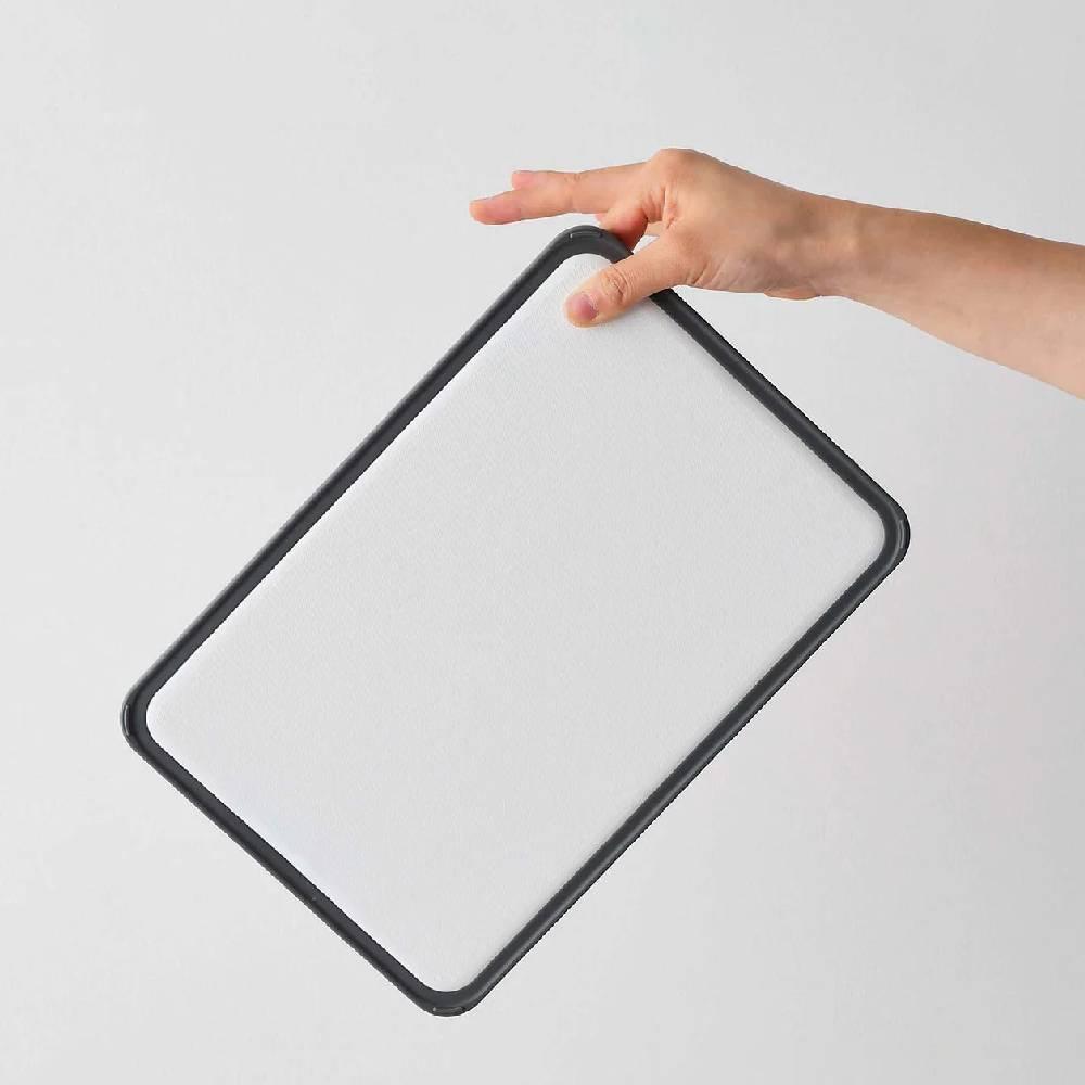 CB Japan 31.2cm white antibacterial lightweight cutting board showing its sleek dishwasher-safe design
