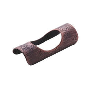 Handcrafted Tanabe bronze chopstick rest featuring traditional Japanese geometric patterns