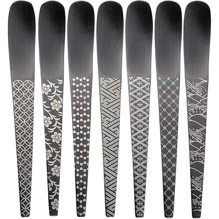 7-piece set of Todai Japanese black steel coffee stirrers with a matte black finish and minimalist design