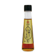 90g bottle of Wadaman Organic Golden Sesame Oil featuring deep roasted golden sesame seeds and JAS organic certification label
