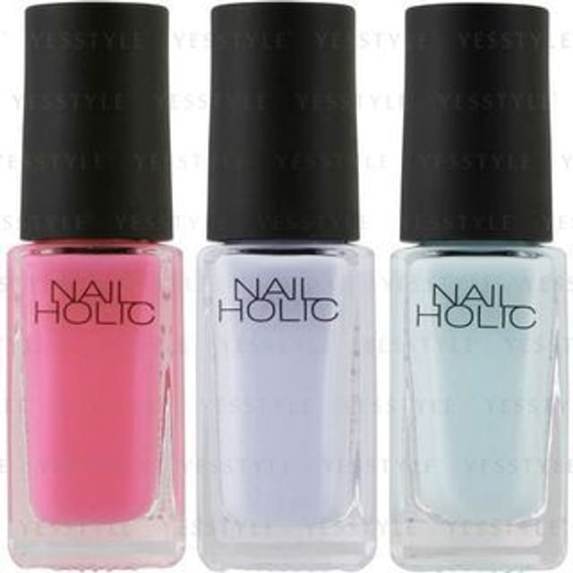 Kose Nail Holic Milky Color nail polish bottles in various pastel shades displayed on a white background.