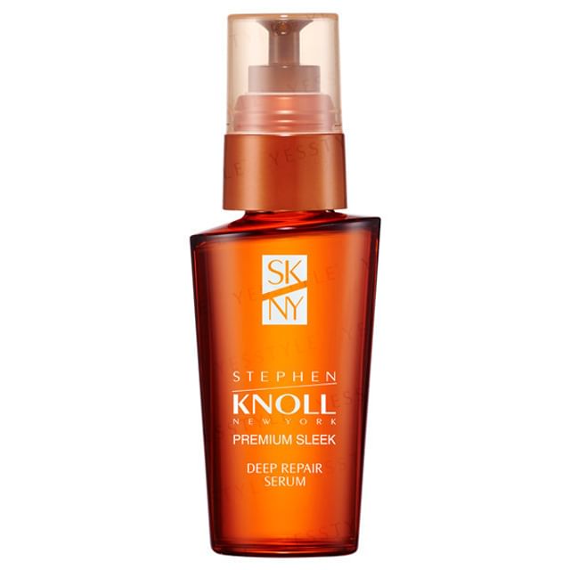 Kose Stephen Knoll Premium Sleek Deep Repair Serum bottle close-up, showcasing its sleek design and smooth texture.