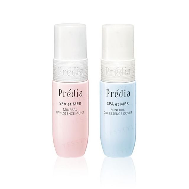 Kose Predia Spa et Mer Mineral Day Essence SPF 30 PA+++ bottle on a white surface with soft lighting, showcasing the product's elegant packaging and texture.