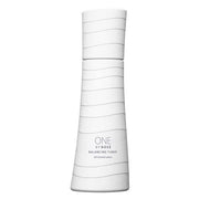 Kose One By Kose Balancing Tuner Oil Control Lotion bottle and texture on hand.