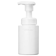 Kose Sekkisei Clear Wellness Gentle Wash bottle displayed with botanical ingredients, highlighting its hydrating and cleansing benefits.