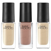 Kose Nail Holic Sheer Milk Color nail polish collection. Delicate milk-inspired shades for a natural, elegant manicure.