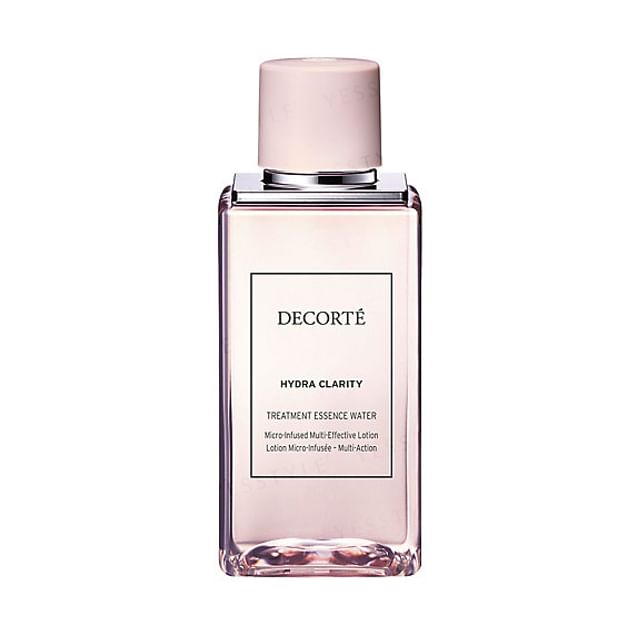 Kose DECORTE Hydra Clarity Treatment Essence Water bottle on a clean, radiant background, showcasing its luxurious texture and packaging.