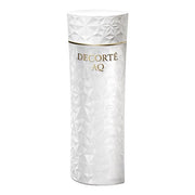 Kose DECORTE AQ Toning Lotion A bottle displayed on a reflective surface, highlighting its elegant packaging and the light texture of the product.