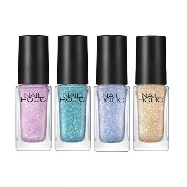 Kose Nail Holic Shinny Nail Color collection displayed with various shades and a glossy finish.