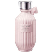 Kose DECORTE Kimono Yui Perfumed Body Lotion bottle on a silk background with cherry blossom accents.