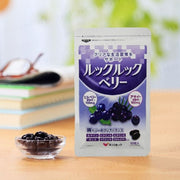 LOOKLOOK Berry supplement bottle with berries and eye illustration