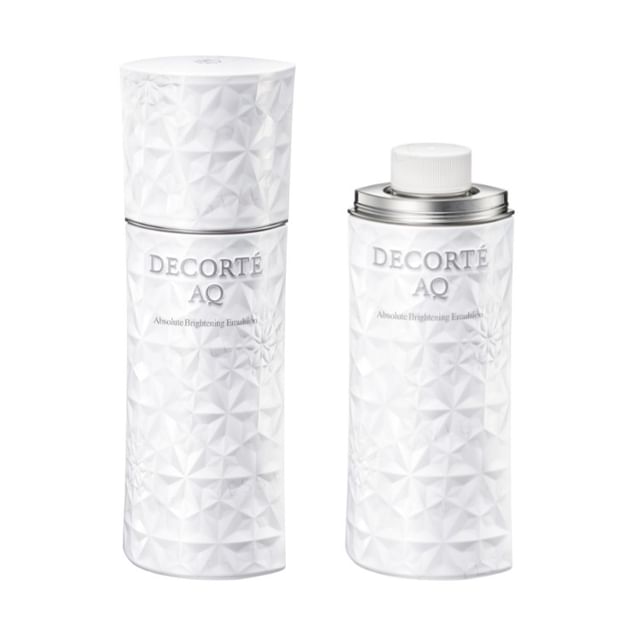 Kose DECORTE AQ Absolute Brightening Emulsion bottle with radiant skin effect.