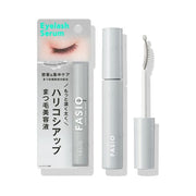 Kose Fasio Eyelash Repair Serum bottle close-up, showcasing the applicator brush and product texture.