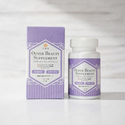Rokkado Outer Beauty Supplement bottle and capsules with radiant skin glow effect