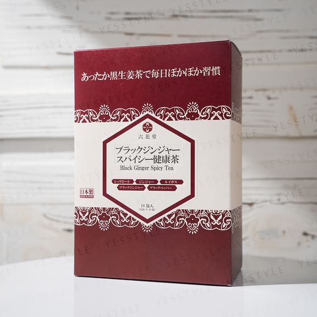 Close-up of a steaming cup of Rokkado Spicy Ginger Tea, highlighting the rich color and inviting aroma.