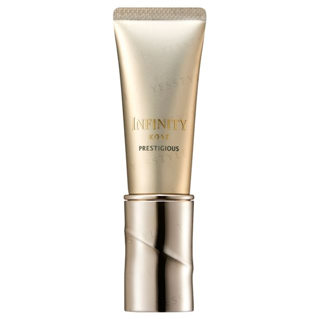 Kose INFINITY Prestigious Intensive Rejuvenating Eye Zone Serum - Close up of the serum bottle showcasing its luxurious texture and design.