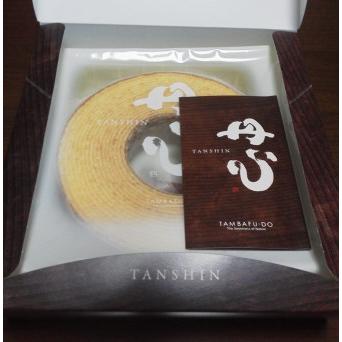 A single slice of Yanagawa Gluten-Free Milk Jam Rice Flour Baumkuchen showing delicate golden layers