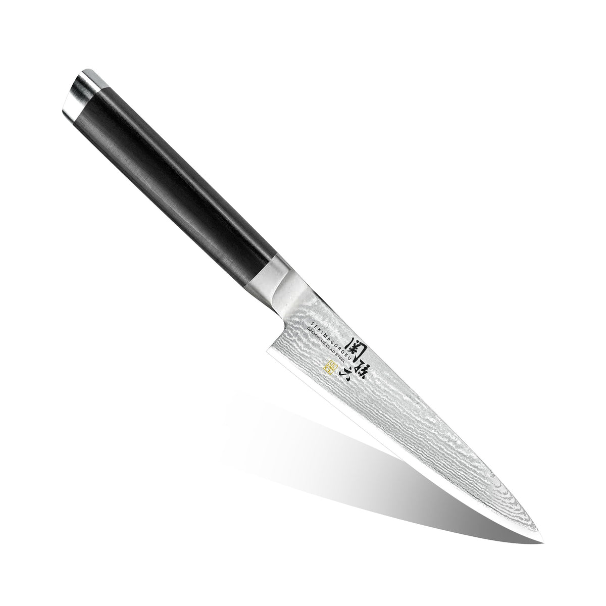 KAI Seki Magoroku Damascus — Petty 120 mm — Full exact knife on white, showing blade profile, layered steel pattern, dark wood handle, steel bolster and endcap; no accessory shown.