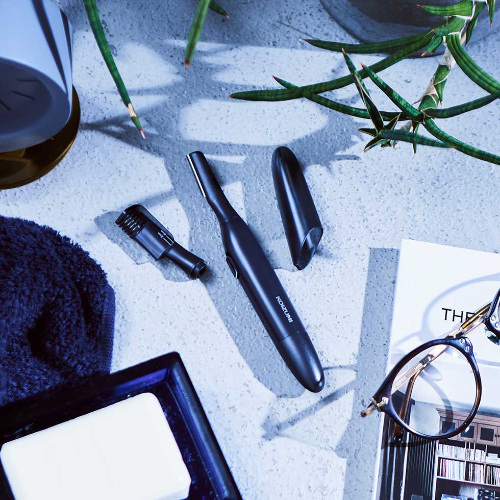 Koizumi KMC-0651 Face and Brow Shaver, Battery-Powered 2-Way Pen Shaver with Washable Attachments, Brow Comb and Cap, AAA Battery Not Included, Grey