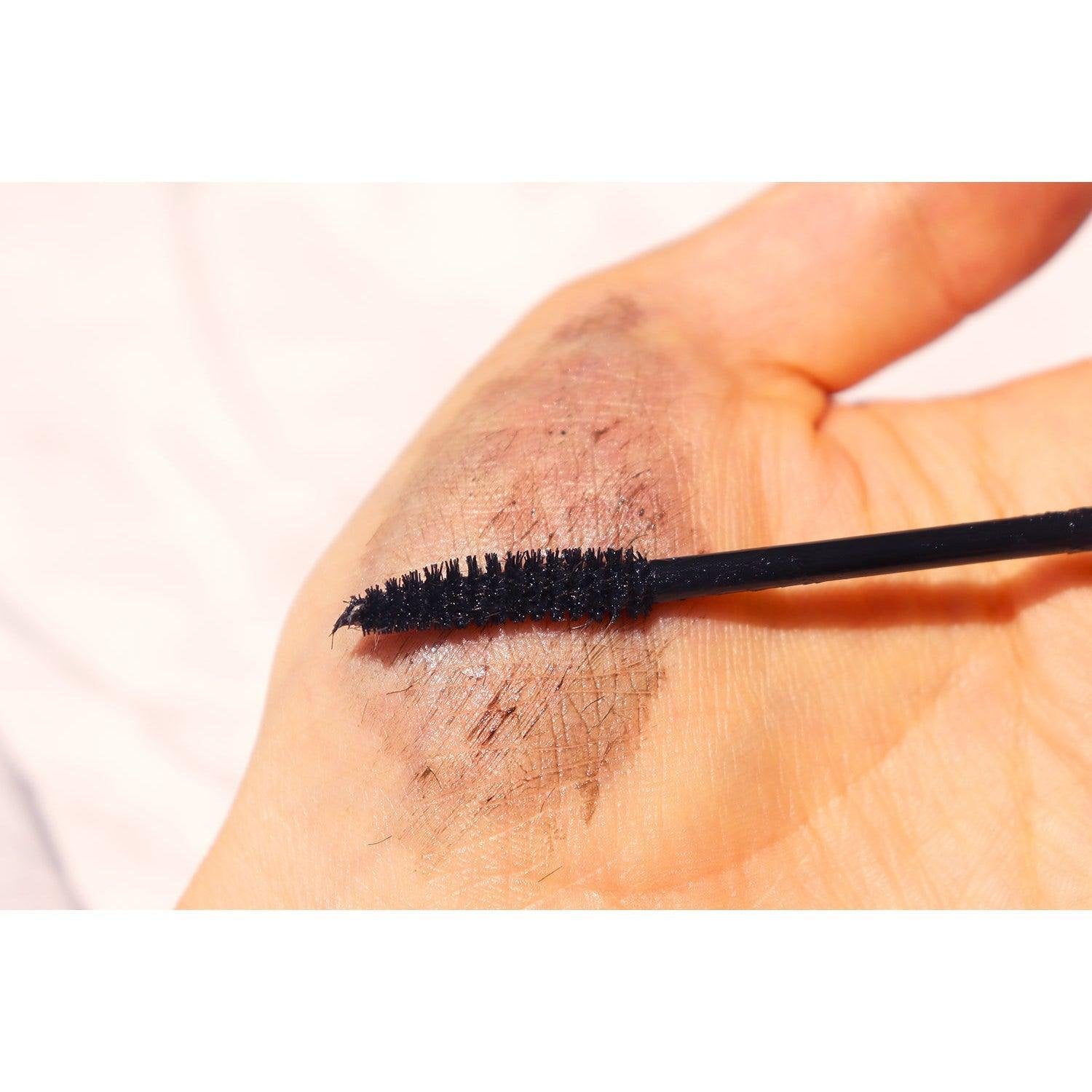 Pmel sheer black waterproof mascara — application view